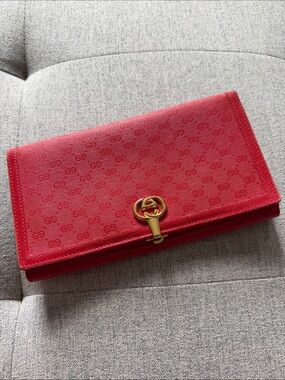 Gucci Red Embossed GG Leather Clutch with Gold-Tone Hardware